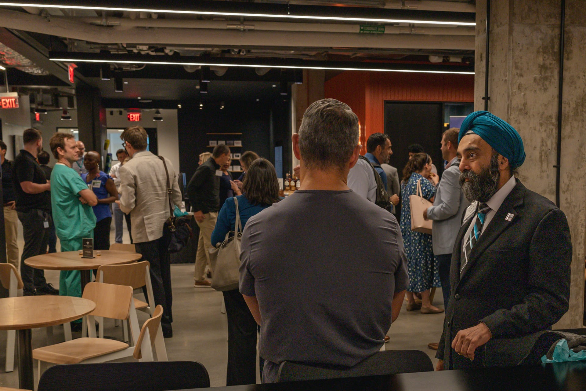 A full room at the AI conference reception at Connect Labs, The Pearl